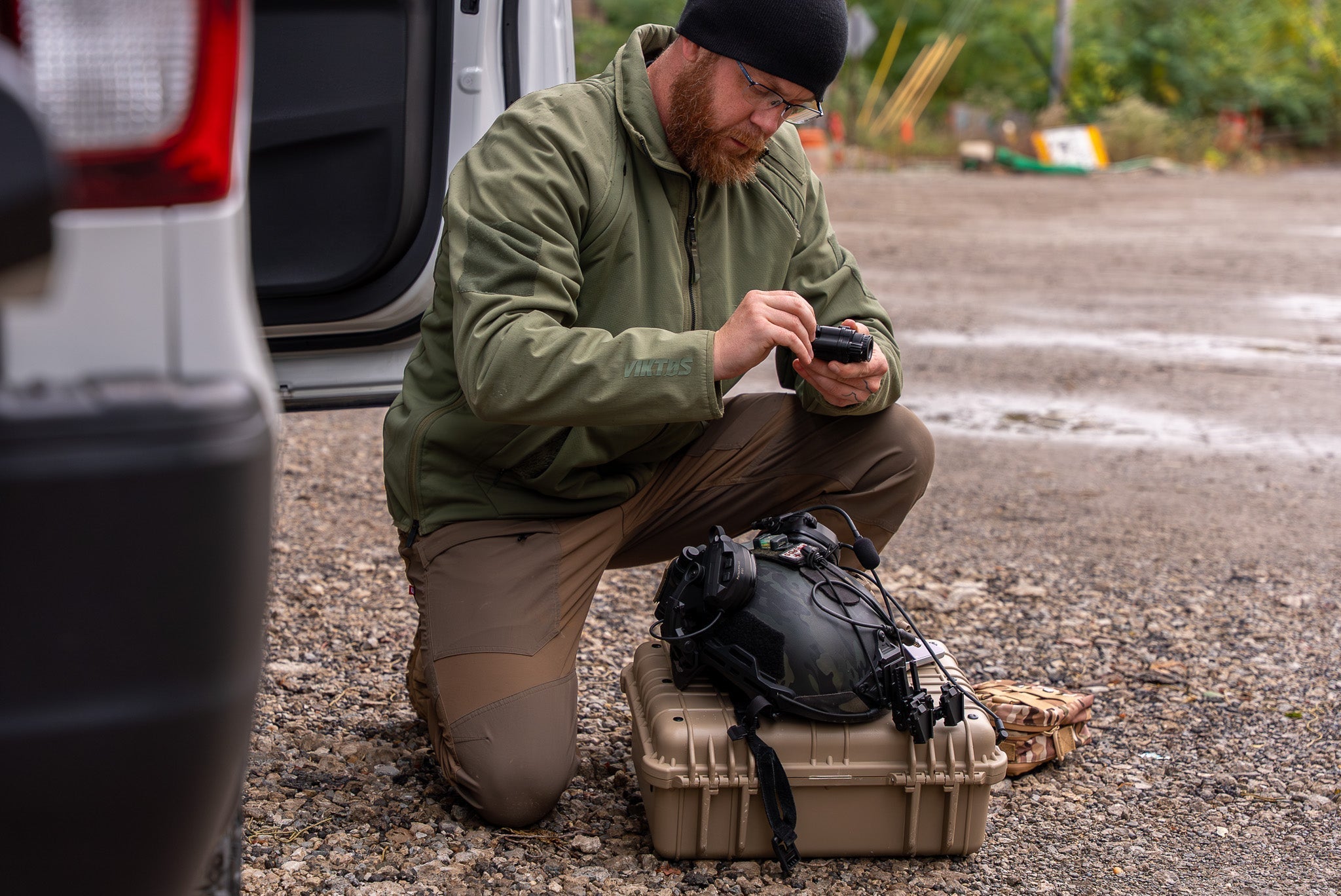 Adjusting DNVS-14 Pro Night Vision Goggles before tactical deployment in the field