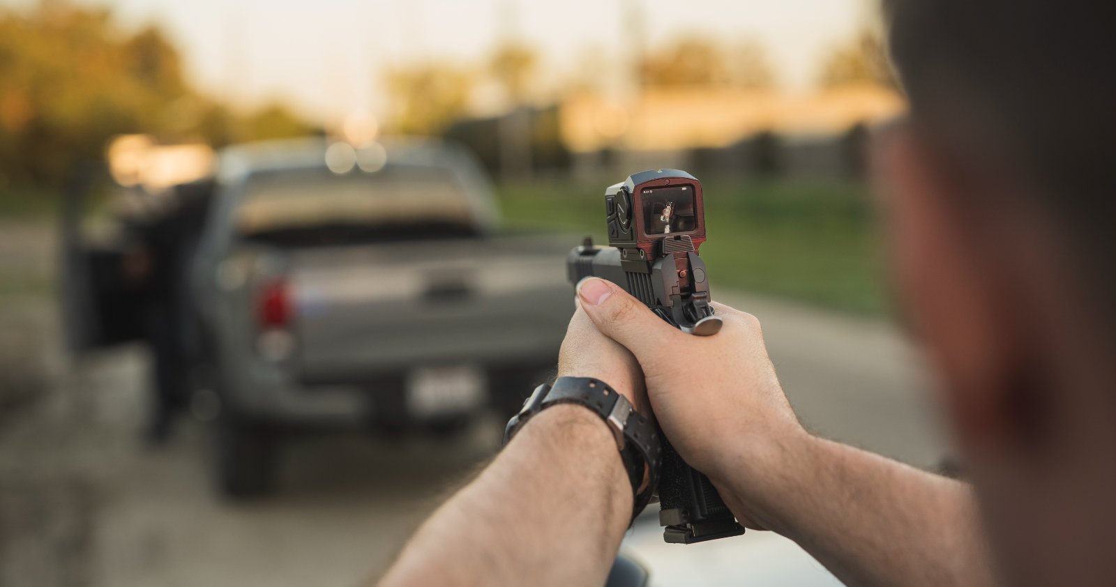 POV aiming pistol with FMP13 thermal sight in home defense training scenario