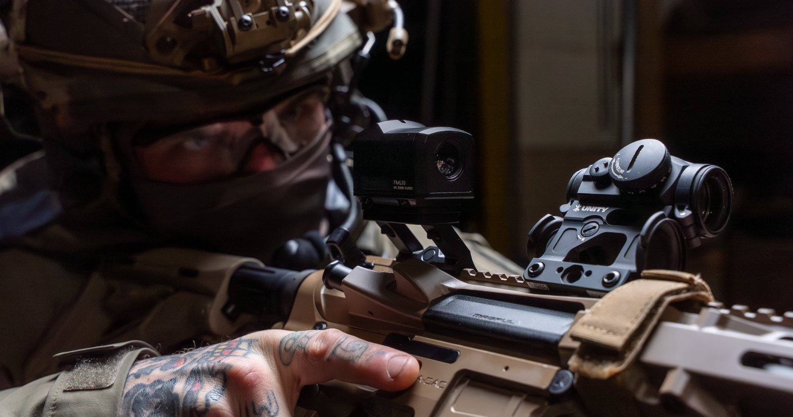 A shooter aiming through the high-resolution FML19 thermal detector with a 19mm lens, highlighting the improved clarity and target identification at range.