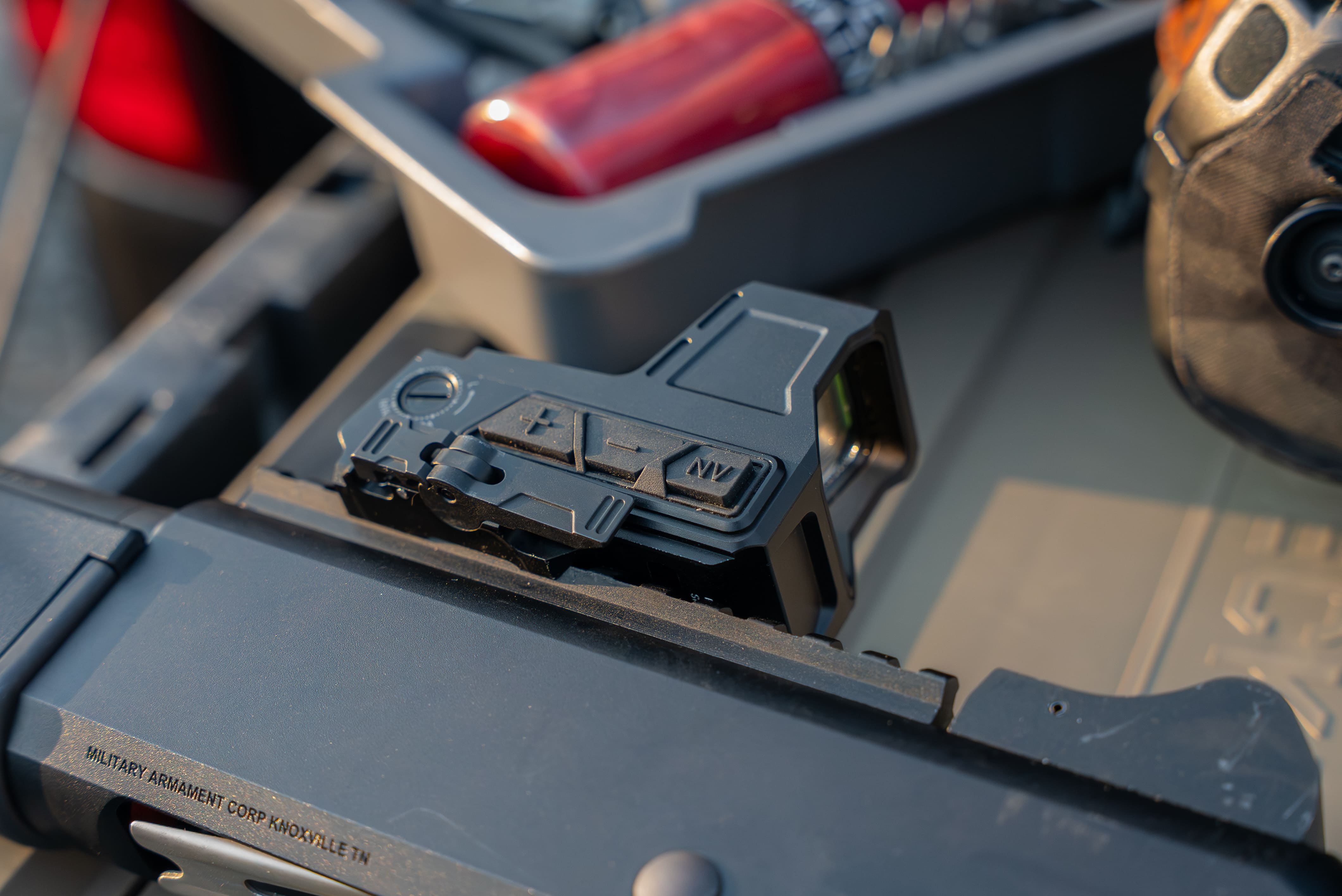 Top-down close-up of the control interface on the Infitac OWS-32 OPTICAL WAVEGUIDE SIGHT
